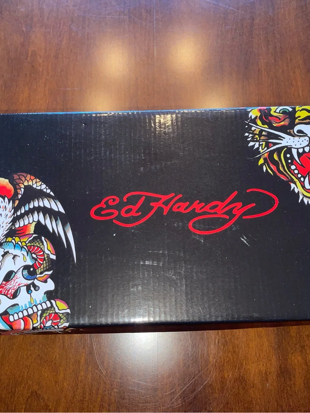 Ed Hardy Black Sneakers with Red and White Skull Graphic